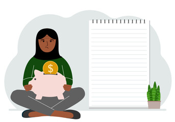 A woman sits cross-legged with a piggy bank in his hands. Nearby is a large sheet of paper for planning income and expenses.