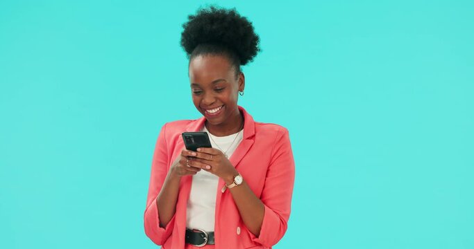 Phone, message and happy black woman in studio texting, laugh or social media chat on blue background. Smartphone, app and African lady online for meme, post or funny, joke or silly gif communication