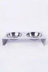 Dry dog and cat food in metal bowl, top view and flat lay