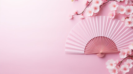  Japanese folding fan in pink, with cherry blossom for, copy space 