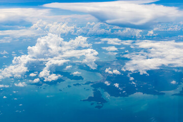 Deep Blue Indian Ocean with Cloud and an Island seen from Sky