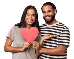 Latina couple with Valentine's sign showing a copy space on a palm and holding another hand on waist.