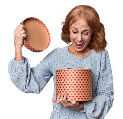 Middle-aged Caucasian woman with Valentine's heart expressing emotions
