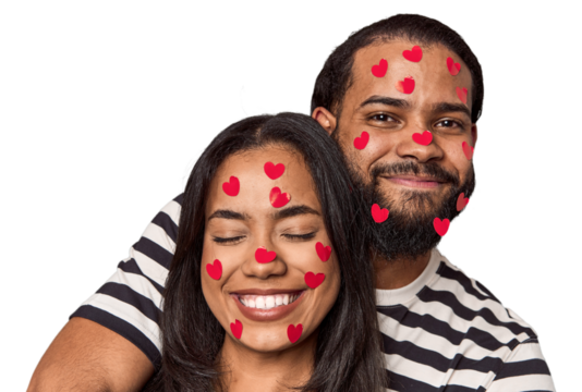 Young Latin couple with heart stickers, joyful, Valentine's