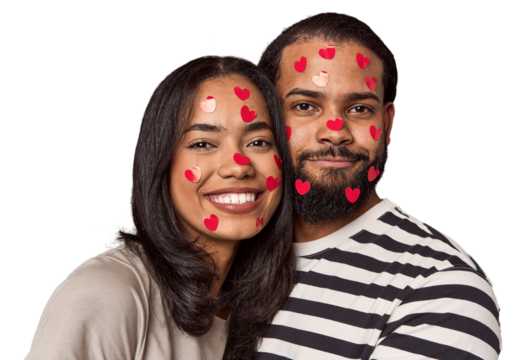 Young Latin couple with heart stickers, joyful, Valentine's