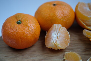 tangerines on a wooden table