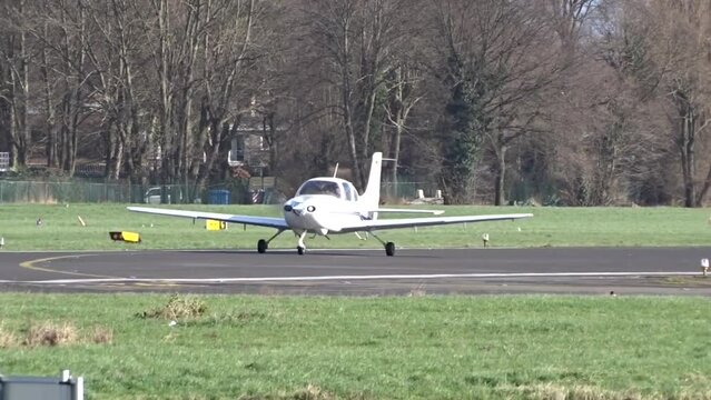 Plane Airplane Aircraft Small Regional Turboprop Taxiing on Runway after landing at Airport