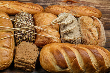 Fresh loaves of bread, various breads for toasts and sandwiches, delicious crispy breads,...