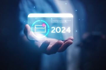 Businessman using laptop computer to check email notifications with icons or hologram online communication technology concept
Communication concept 2024