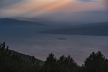 Atmospheric view over the Croatian Adriatic coast with its islands at sunset.