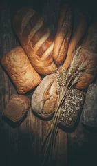 Zelfklevend Fotobehang Fresh loaves of bread, various breads for toasts and sandwiches, delicious crispy breads, gluten-free breads, fresh flour and wheat breads © Anton
