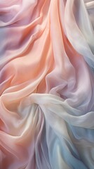 A background of crumpled delicate transparent fabric in warm pastel-colored blue, orange and violet...