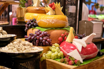 Cheese and grape selection on display, a classic pairing. The rise of artisanal cheese reflects a...