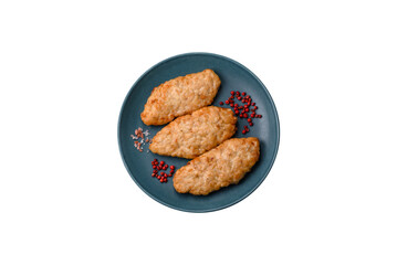 Delicious fresh fried minced fish or chicken cutlets with spices and herbs
