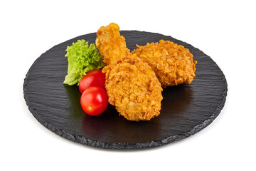 Fried Chicken in breadcrumbs, isolated on white background.