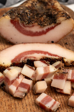 Pieces of traditional Italian cured meat guanciale.
