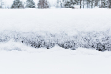 Snow-covered roof of a house under construction