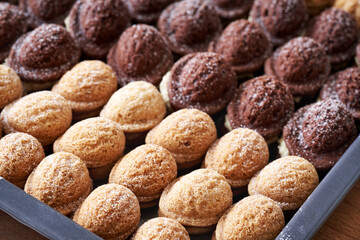 Nut shaped homemade Christmas cookies filled with cream