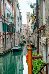 View of the narrow canal in Venice, Italy