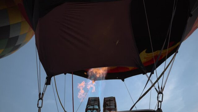 Close up of the fire mechanisms that make hot air balloons fly during a beautiful sunrise in the mountains of Serra da Canastra in Minas Gerais, southeastern state of Brazil