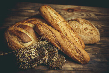 Fresh loaves of bread, various breads for toasts and sandwiches, delicious crispy breads,...
