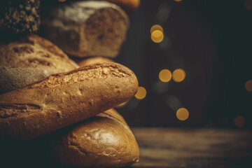 Fresh loaves of bread, various breads for toasts and sandwiches, delicious crispy breads, gluten-free breads, fresh flour and wheat breads - obrazy, fototapety, plakaty
