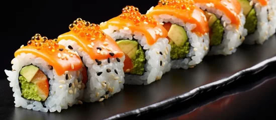  California roll sushi topped with orange roe. © TheWaterMeloonProjec