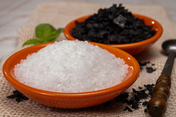 Black and white sea salt close up, Cyprus Black Salt shiny black pyramid-shaped crystals