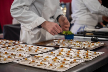 Degustation appetisers for visitors made by great chefs of high cuisine French restaurants, winter...