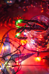 new year's lights garlands and toys decorations, Christmas preparations at home, selective focus