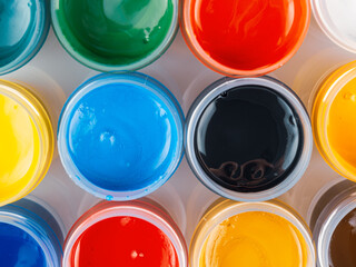 Jars of acrylic gouache paint art painting creativity and development