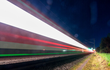 Light trails of a train, concept for high-speed under the stars