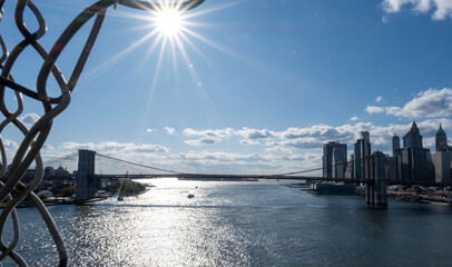 View of Brooklyn Bridge from Manhattan bridge on a bright and sunny day in New York City