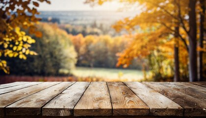 wooden table top with blur background of autumn
