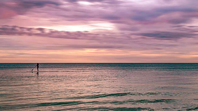 Sunset on the beach, paddle boarding, Original photo by Christy Mandeville, Redington Beach, Florida