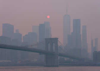 Downtown Manhattan at sunset on a smoky day