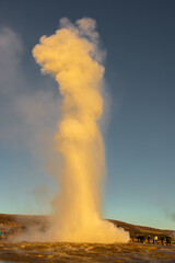  Stokkur geyser spectacular eruption in front of aa crowd of tourists, Iceland