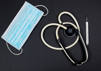 Medical instruments on a black background, doctor tools for treating people from illness