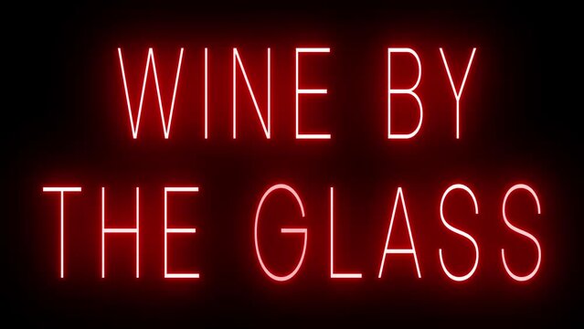 Flickering red retro style neon sign glowing against a black background for DRINKS