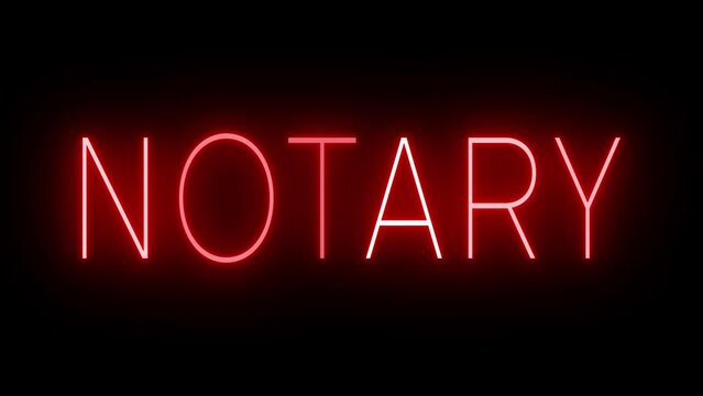 Flickering red retro style neon sign glowing against a black background for NOTARY