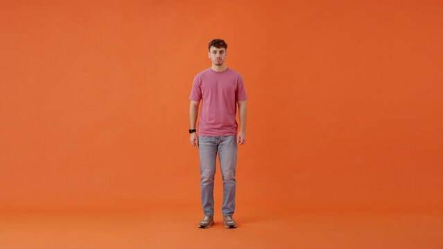 Man jumping on spot and changing outfit into formal attire