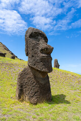 Easter Island, Chile - March 4, 2023: Moai Piro Piro close up at Rano Raraku on Easter Island (Rapa Nui), Chile. Rano Raraku is commonly known as the “Moai Factory”.