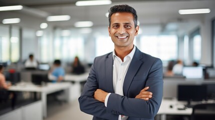  Indian Businessman Standing With His Arms Crossed 