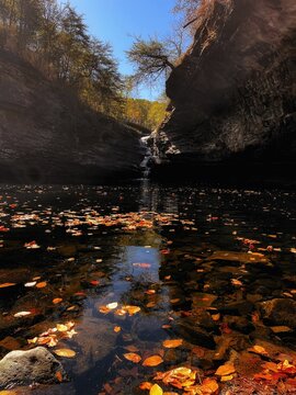 Reflective autumn waterfall