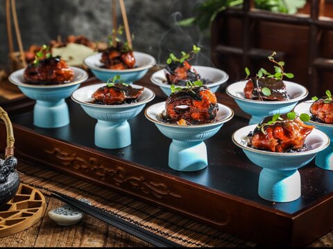 Chinese braised pork in high end sophisticated fine dining restaurant, expensive food, dark background with smoke