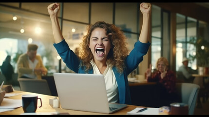 A young businesswoman in front of a laptop cheerfully celebrates success - obrazy, fototapety, plakaty