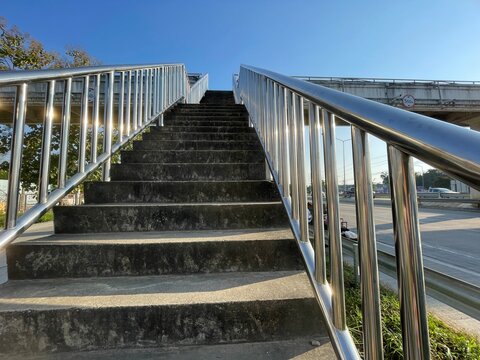 Picture of stairs leading up to the overpass