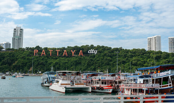 Pattaya, Thailand - December 15, 2023: Pattaya City Sign, hillside landmark featuring town name in giant letters. view from ferry at bali hai pier