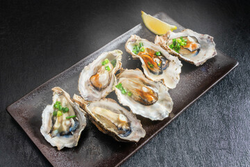 むし牡蠣料理　Photo of delicious steamed fresh oysters - 694195574