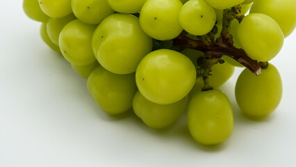 Beautiful a bunch of Shine Muscat green grape isolated on white background.